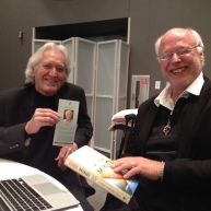 Larry Dossey holding Börje's book flyer and Börje holding Larry's new book "The One Mind"